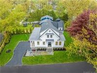 EXCEPTIONAL NEW HOME IN COS COB WITH SEASONAL RIVER VIEWS 