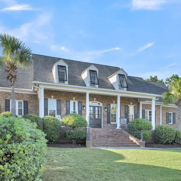 STATELY AND TIMELESS BRICK HOME
