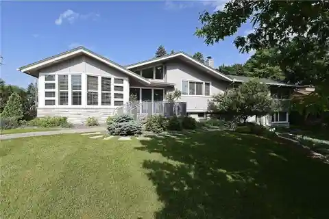 Mid-century Modern Luxury Home Steps from Cedar Lake