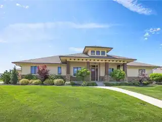 Meticulously Maintained Reverse 1.5-story Home