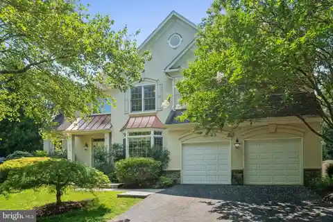 Charming Home Nestled Under Mature Trees