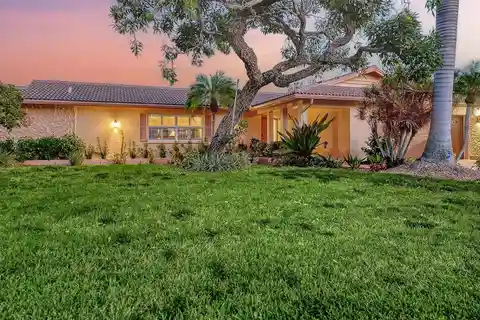 Classic Canal-Front Masonry Beach Home
