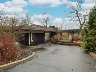 Mid-century Modern Home in a Private Wooded Enclave