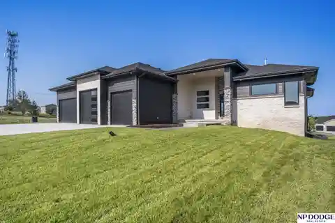 Modern Elkhorn Ranch with Covered Deck and Four-car Garage