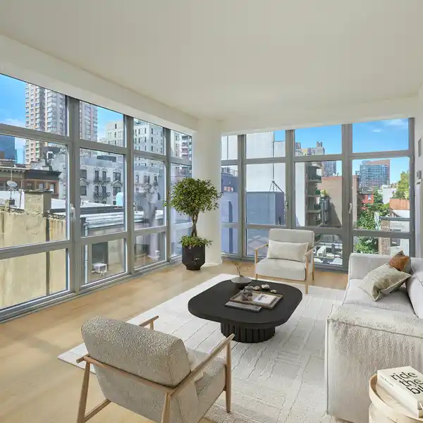 SUN-FILLED CORNER RESIDENCE AT THE LINK CONDOMINIUM