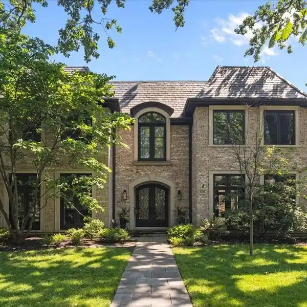 CUSTOM BRICK HOME ON A WIDE CORNER LOT