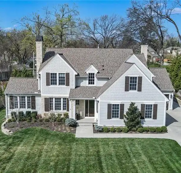 CHARMING CAPE COD HOME ON A LARGE LOT