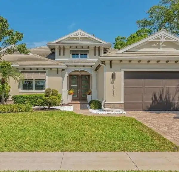 EXCEPTIONAL COASTAL HOME WITH RESORT-STYLE OUTDOOR LIVING