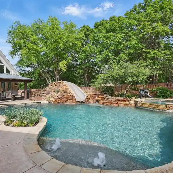 EXCEPTIONAL CUSTOM RESIDENCE WITH RARE GUEST HOUSE