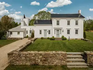 Exceptional Greek Revival Farmhouse Reimagined