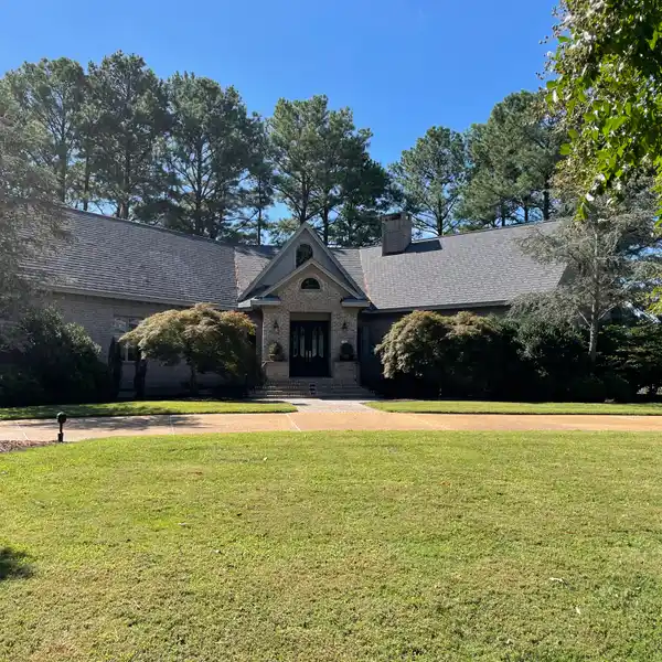 EXCLUSIVE RIVERFRONT ESTATE WITH VERSATILE DESIGN