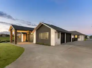 North-Facing Brick Estate with Triple Garage