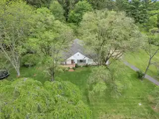 Elegant Custom Home on 9+ Private Acres