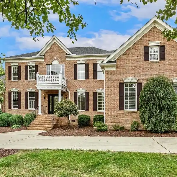 BRICK BEAUTY WITH VAULTED INTERIORS AND ELEGANCE