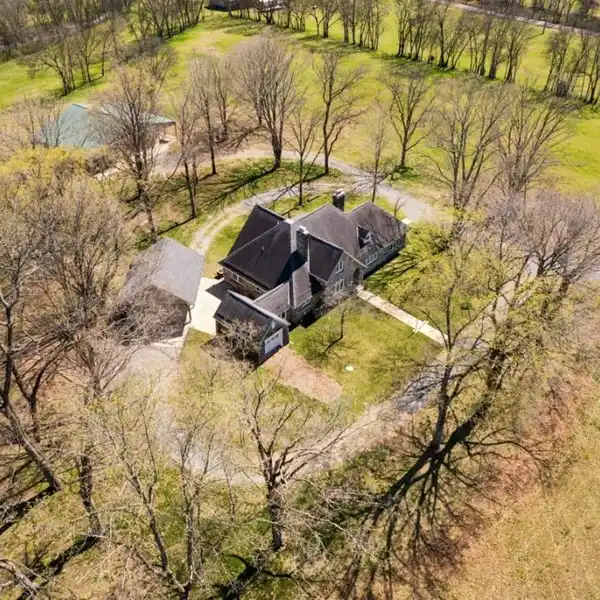 DISTINCTIVE STONE HOUSE ON 8.56 ACRES