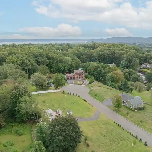 LUXURIOUS CUSTOM BUILT MINI-ESTATE COLONIAL