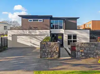 Architectural Coastal Masterpiece Moments from the Beach
