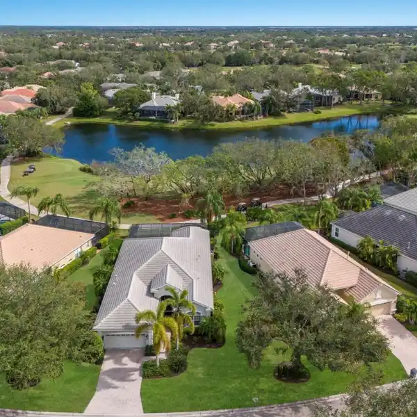 OPEN-CONCEPT SINGLE-STORY IN A LUSH GOLF COURSE SETTING