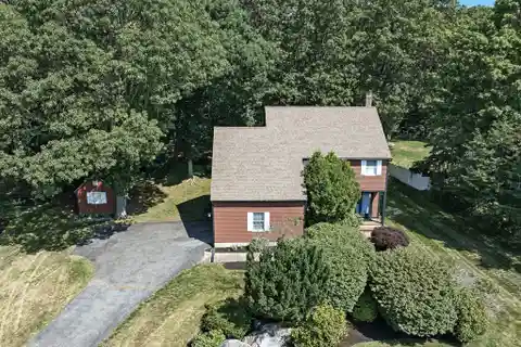 Meticulously Maintained and Improved Home in Coveted Squire's Glen