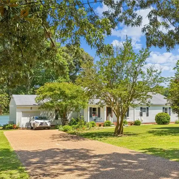 ONE-FLOOR WATERFRONT HOME WITH EXPANSIVE PORCH