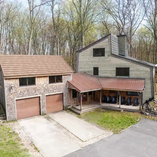 ONE-OF-A-KIND CUSTOM HOME ON 20 ACRES