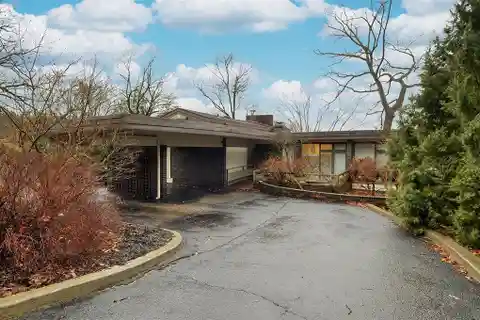 Mid-century Modern Home in a Private Wooded Enclave