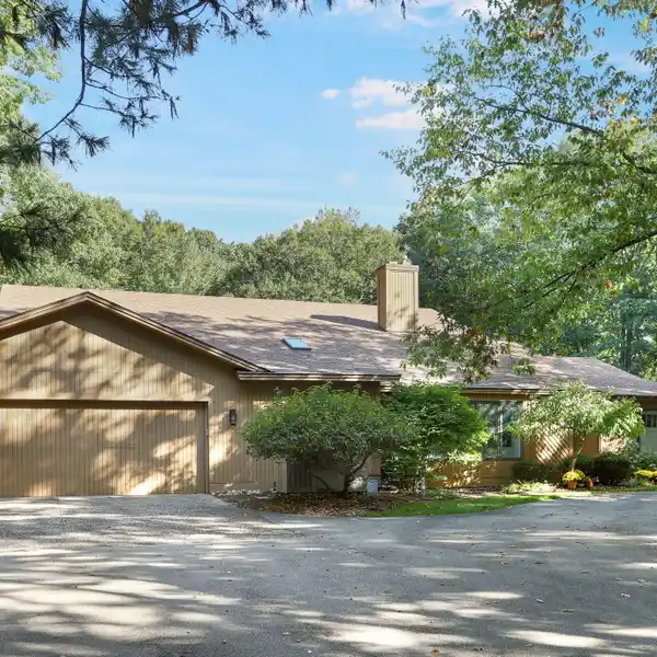 UPDATED LAKESHORE DRIVE HOME WITH DECK, POOL & ENTERTAINMENT SPACES