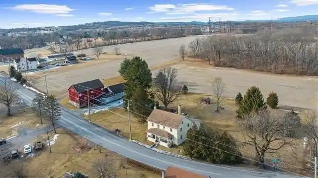 Prime Land Featuring a Classic Colonial Farmhouse