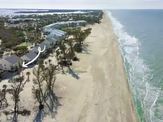 Exquisite Completely Renovated Turnkey Condo Steps to the Sand