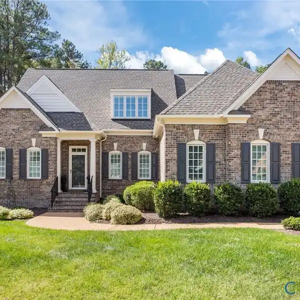 BRICK SOPHISTICATION WITH CHEF’S KITCHEN AND PORCH