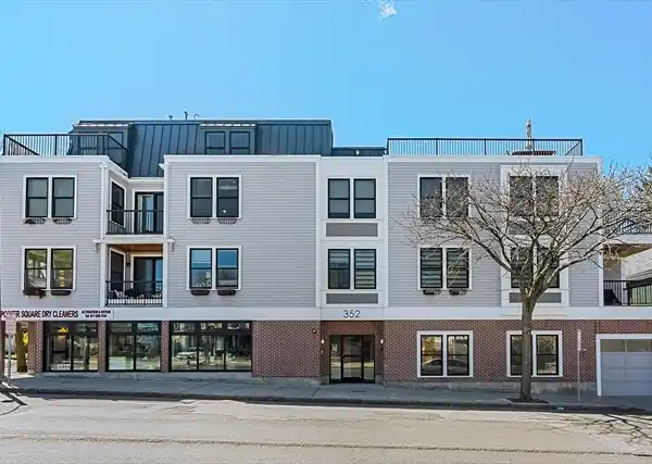 BEAUTIFULLY DESIGNED DAVIS SQUARE TWO-LEVEL CONDO