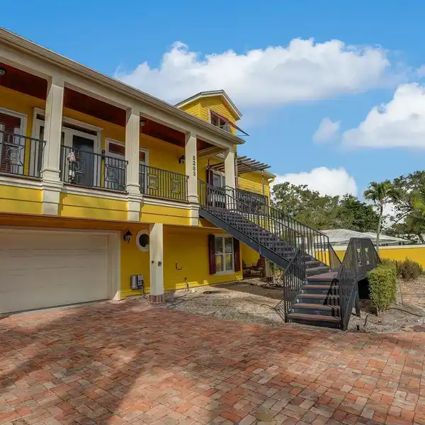 TIMELESS THREE-STORY WATERFRONT HOME