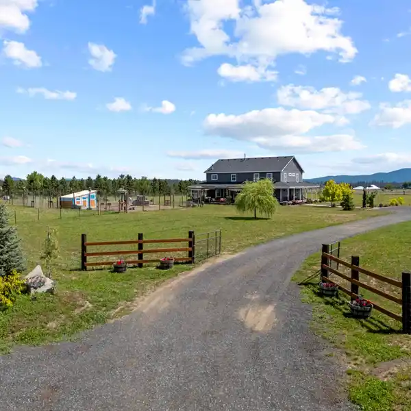 EXPANSIVE FARMHOUSE RETREAT WITH MODERN UPGRADES