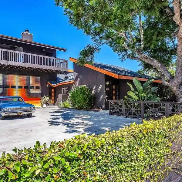 UPSCALE BEACH COMMUNITY LIVING WITH EXPANSIVE SIX-CAR GARAGE