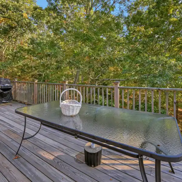 THREE BEDROOM HOME ON A SPACIOUS WOODED LOT