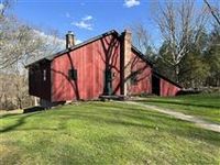 87 ACRES OF LAND WITH A NEWLY RENOVATED HOME IN CLINTON