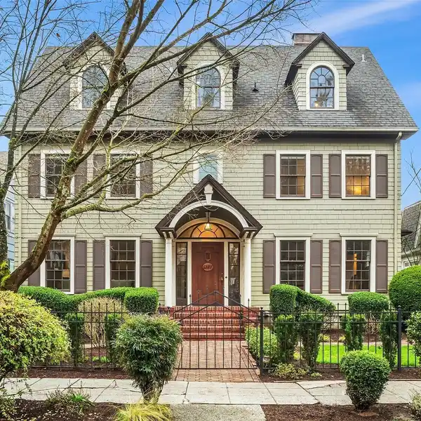THREE-STORY NEW ENGLAND-INSPIRED COLONIAL HOME