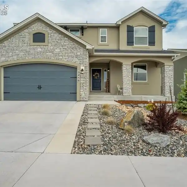 ELEGANT LIVING IN COVETED WOLF RANCH COMMUNITY