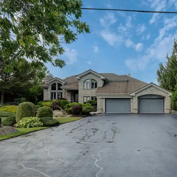 VALUE PACKED RESIDENCE WITH UNOBSTRUCTED WATERVIEWS
