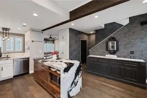 Extensively Renovated Townhome Blocks from the Sand