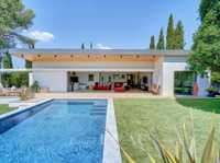 CONTEMPORARY LUXURY HOME IN A PEACEFUL SETTING