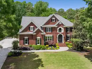Traditional-style Masterpiece in Prestigious Falls of Autry Mill