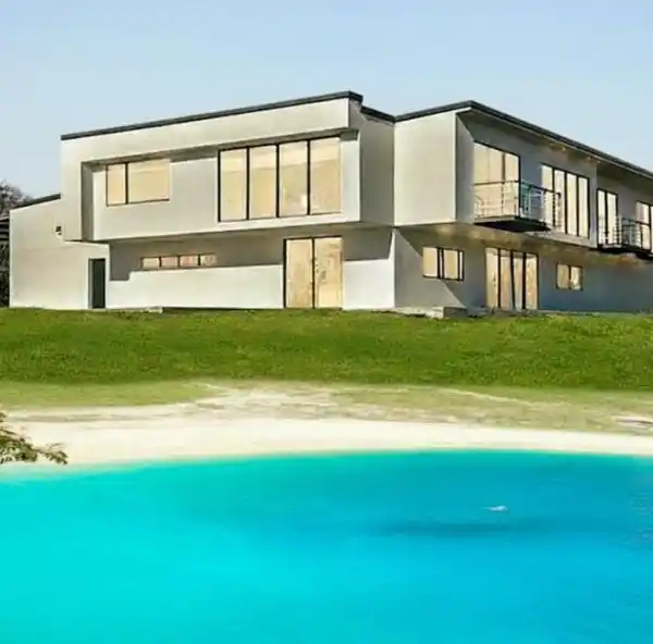 EXTRAORDINARY CONTEMPORARY ESTATE WITH SOARING 20-FOOT WINDOWS