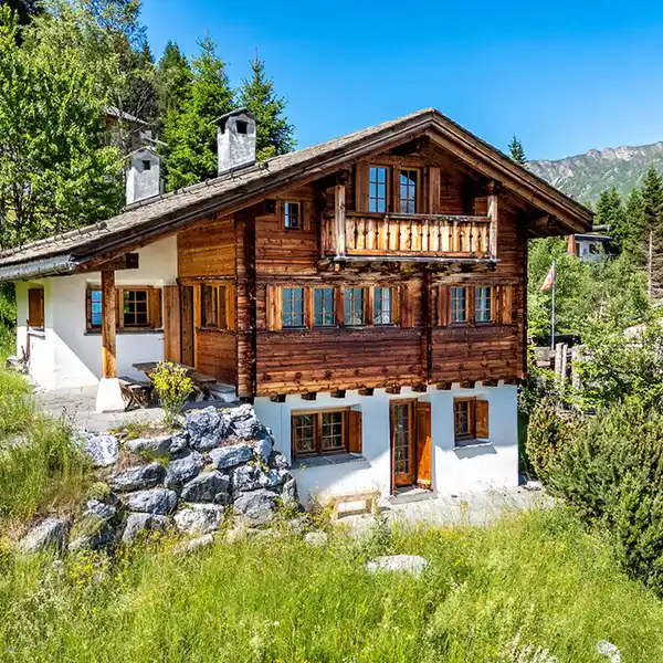 MAISSEN HOLIDAY HOME IN VALBELLA WITH VIEWS AND SKI-IN/SKI-OUT PERKS