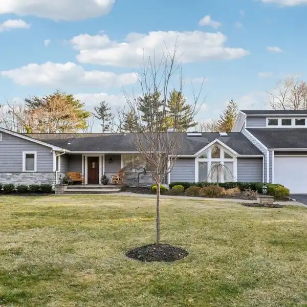 SPRAWLING FIVE BEDROOM EXPANDED RANCH