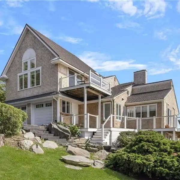 LUXURY AND TRANQUILITY ON 2.5 WATERFRONT ACRES