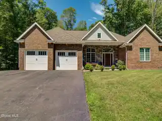 Custom Brick Beauty with Backyard Vacation Oasis
