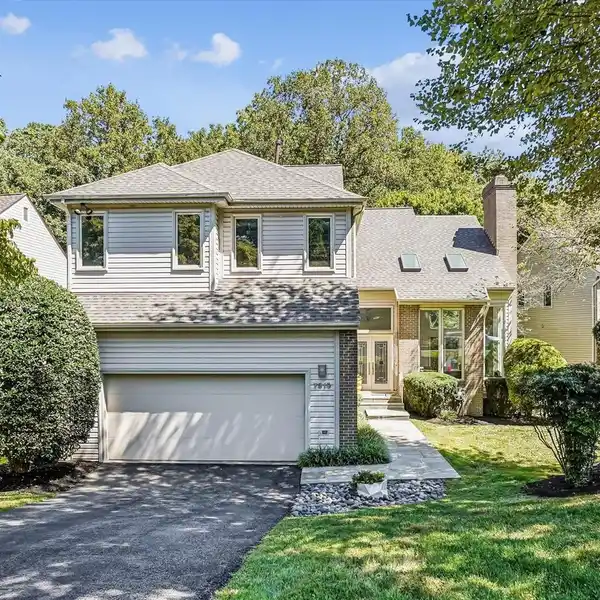 CONTEMPORARY ELEGANCE AMID SERENE CREEKSIDE VIEWS