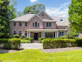 Stunning Custom Home in the Sought-after Spring Brook Section