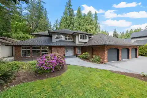 Elegant Estate with Serene Creekside Backyard